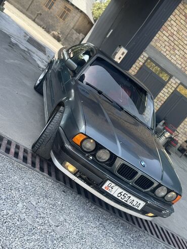 сколько стоит спойлер: BMW 5 Series E34, седан, темно‑серый металлик. Основные особенности