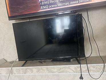 тв тюнер для телевизора: Телевизор LED, диагональ ориентировочно 32–40". Черный корпус, тонкие — 1