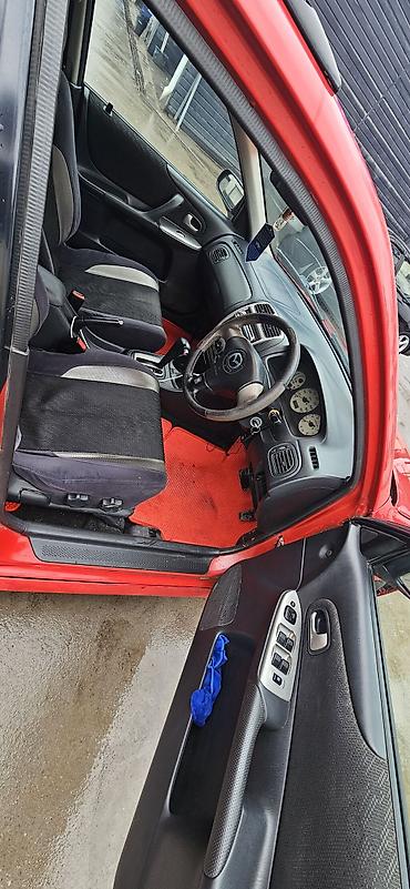 Mazda: Mazda Familia: 2001 г., 2 л, Автомат, Бензин, Универсал — 2