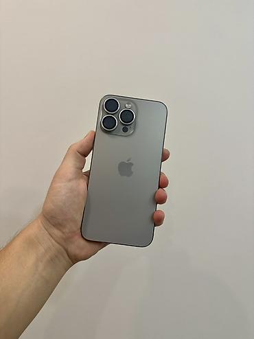 apple magic: IPhone 15 Pro Max, Б/у, 256 ГБ, Natural Titanium, Защитное стекло, Чехол, Кабель, 84 % — 2