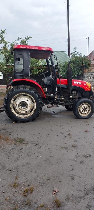 Kommersiya nəqliyyat vasitələri: YTO mini traktor – kabinli, 4 təkərli, arxa asqı sistemi və PTO çıxışı — 3