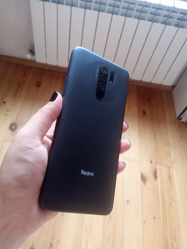 Redmi 9, 32 ГБ, цвет - Черный, Отпечаток пальца, Две SIM карты