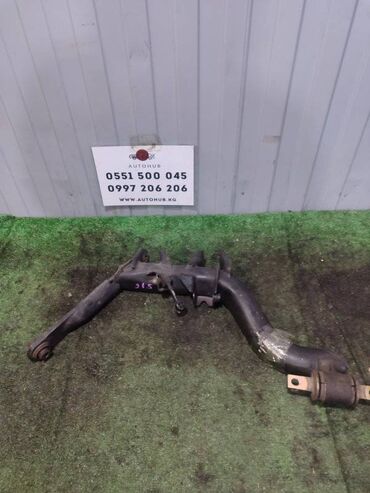 Двери и комплектующие: Задний правый рычаг Honda