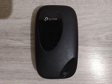 Модемы и сетевое оборудование: TP-Link M7000 4G. Универсальный карманный Wi-Fi роутер. Работает с — 2