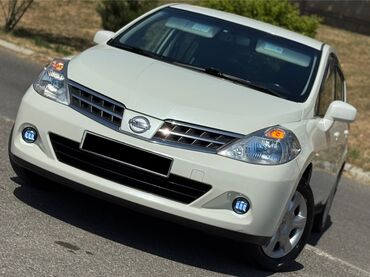 Nissan: Nissan Tiida: 1.5 l | 2011 il Hetçbek