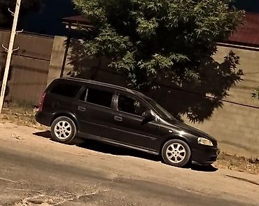 mini cooper kreditle: Opel Astra Caravan (universał) – qara rəngdə, benzinli Xüsusiyyətlər — 3