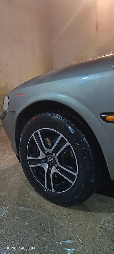 Disklər: İşlənmiş Disk Opel R 15, 5 Boltlu — 4