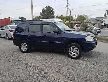 Reliant: Mazda Tribute: 2003 г., 2 л, Механика, Газ, Кроссовер — 3