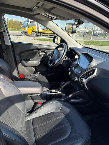 panorama maşın: Hyundai Tucson: 0.2 l | 2009 il Krossover — 8