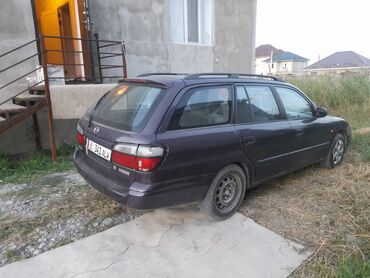 дождевальный машина: Mazda 626: 1998 г., 2 л, Механика, Бензин, Универсал