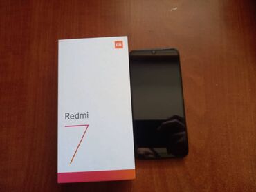 xiaomi 3: Xiaomi Redmi 7, 32 GB, rəng - Qara, 
 Sensor, İki sim kartlı