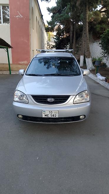 ford focus 2000: Kia Carens: 2 l | 2003 il Van/Minivan — 5