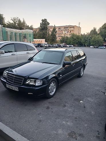 arxa şuşə: Mercedes-Benz C-Class универсал, 500 T modifikasiyası. Avtomobil qara — 3