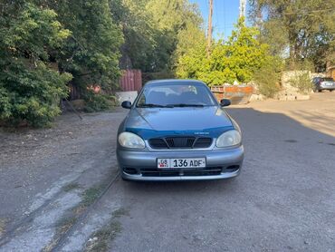 авто москва: Седан Chevrolet Lanos серого цвета. Модель оснащена четырьмя дверями