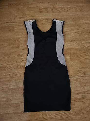 haljina od pliša: Crna ženska haljina bez rukava, uskog kroja (bodycon), dužine iznad — 1
