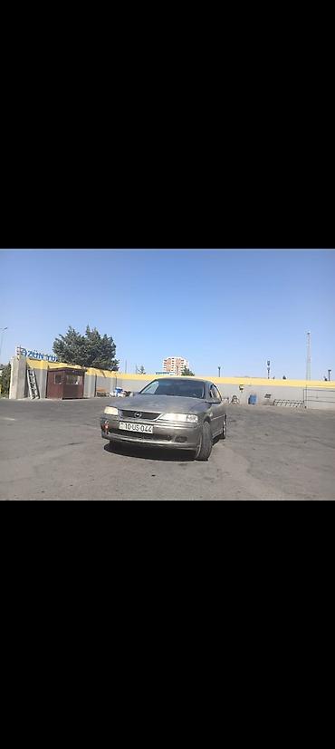 gurcustan avtomobil ehtiyat hisseleri: Opel Vectra B sedan - Korpus: 4 qapılı sedan, boz rəng - Mühərrik və — 2