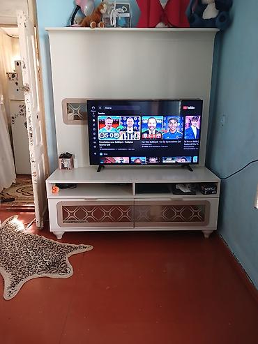 Ağ rəngli TV stendi və dekorativ panel dəsti qiymeti razilas.a yolu