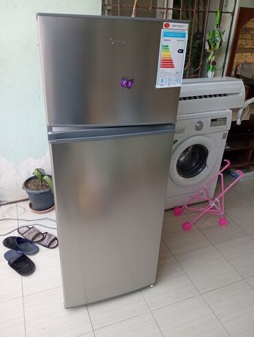 midea soyuducu: Midea soyuducu,teze kimidi,cemi 2 ay işlenib,kocle bağlı