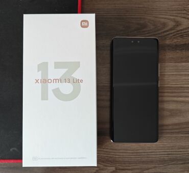 телефон 2023: Xiaomi, 13 Lite, Б/у, 256 ГБ, цвет - Розовый, 2 SIM, eSIM