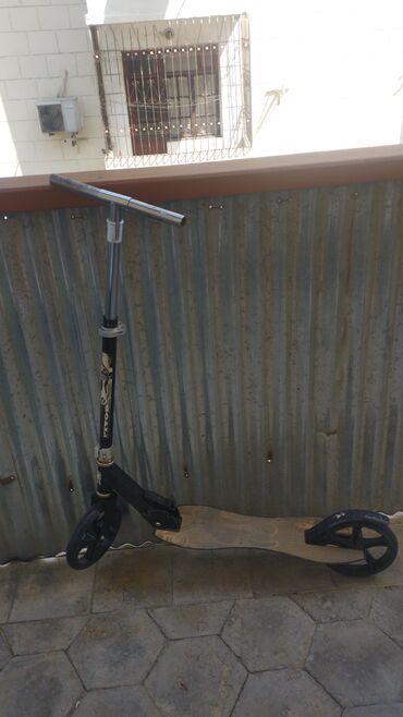 Coğrafiya: Şəhərdaxili rahat hərəkət üçün böyük təkərli scooter - Mexaniki