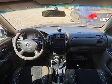 чип панели: Mazda 323: 2002 г., 1.6 л, Автомат, Бензин, Седан — 5