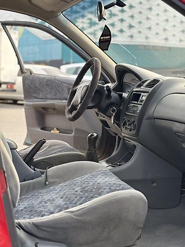 Mazda: Mazda 323: 1998 г., 1.5 л, Механика, Бензин, Универсал — 11