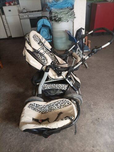 bebe igracke za devojcice: Dečija kolica marke Lux4kids sa leopard printom. Kolica imaju korpu za