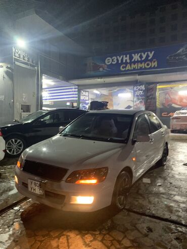 Mitsubishi: Mitsubishi Lancer: 2002 г., 1.5 л, Вариатор, Бензин, Седан