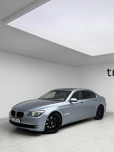 byd e1: BMW 7 series: 2010 г., 4.4 л, Робот, Гибрид, Седан — 2
