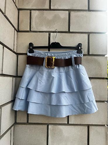 Kompleti: Set ženske odeće – pantalone i tri suknje Plava suknja sorc sa kaisem — 2