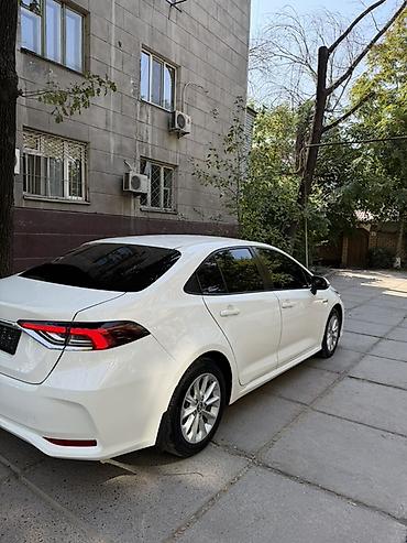 e5 olom: Toyota Corolla: 2022 г., 1.8 л, Вариатор, Гибрид, Седан — 5