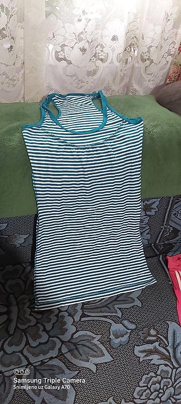 Paketi dečije odeće: Lot haljinica za devojčice – 4 komada 1) Roze pamučna haljinica sa — 4