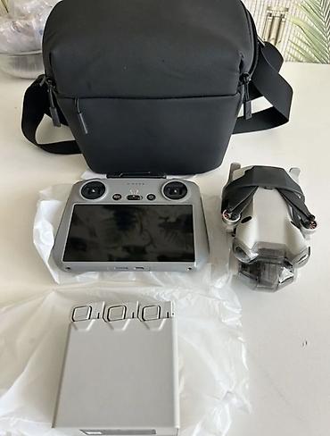 Дроны: DJI Mini 4 Pro Fly More Combo с пультом DJI RC (со встроенным экраном) — 1
