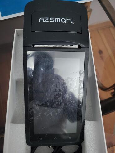 аппарат для мойки машин в баку: AZSmart brendinə məxsus bu qara rəngli, portativ POS terminalı biznes