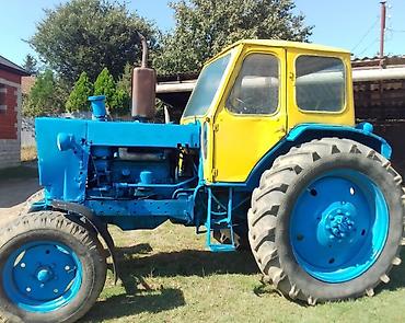 Traktor tam saz vəziyyətdə təkərləri yaxsi radiator super mator
