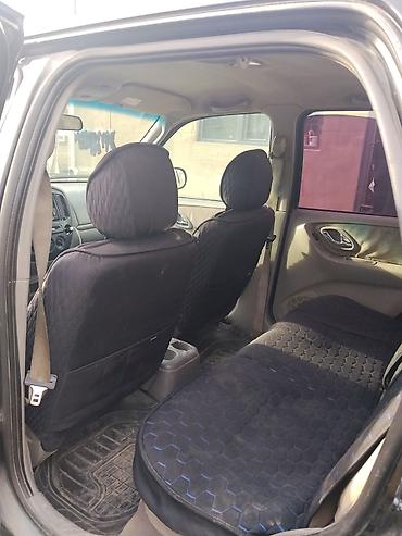 Mazda Tribute: 2002 г., 2 л, Кол менен иштөөчү, Бензин, Кроссовер — 10