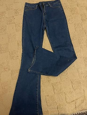 kişi üçün ev şap şapları: Qadınlar üçün tünd-mavi denim şalvar - Kəsim: aşağıdan bir qədər — 1