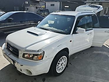 машина номер аукцион: Subaru Forester: 2002 г., 2 л, Автомат, Газ, Универсал — 8