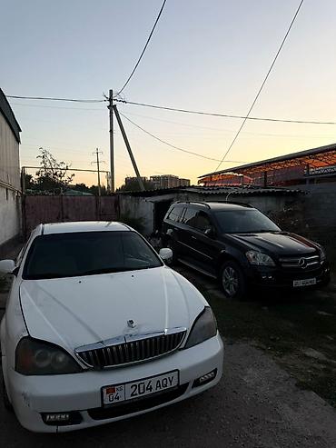 компьютер нексия: Daewoo Magnus: 2004 г., 2 л, Механика, Бензин, Седан — 10