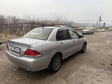 Mitsubishi: Mitsubishi Lancer: 2003 г., Механика, Бензин, Седан — 5