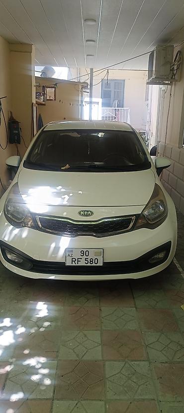 e60 guzgu: Kia Rio sedan – ağ rəng, 4 qapılı, şəhər və tras üçün qənaətcil — 2