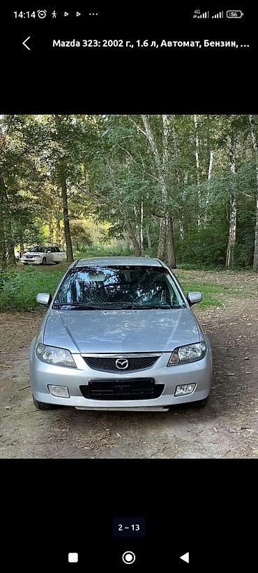 byd e1: Mazda 323: 2002 г., 1.6 л, Автомат, Бензин, Универсал — 2