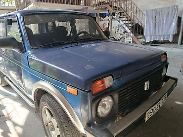 lada diskləri: LADA Niva 4x4, mavi rəng, 5 qapılı universal kuzov. Xüsusiyyətlər: - — 5