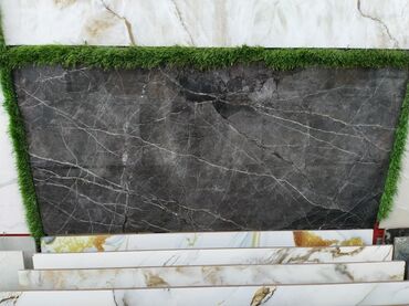 ağ lay: Mərmər görünüşlü keramik plitələr müxtəlif interyer dizaynları üçün