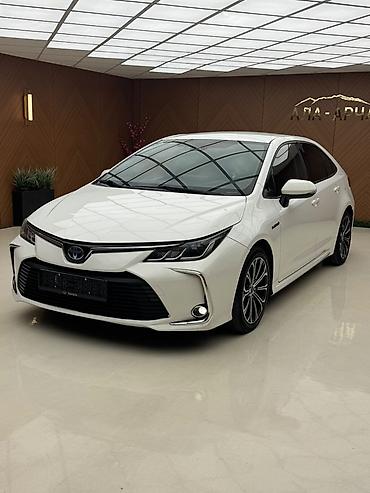 на corolla: Toyota Corolla: 2026 г., Гибрид, Седан — 2