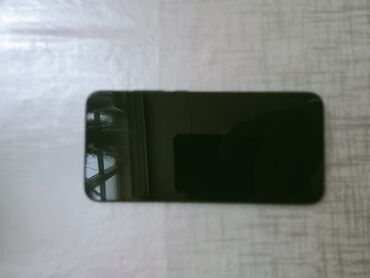 redmi 7 qiymeti 2019: Xiaomi Redmi smartfon (2021) - Model: Redmi (şəkildə arxa hissədə