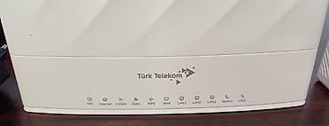 mifi router: Wi-Fi 6 - Gigabit VoIP Router - AX1800 Dual-Band Həm 5 Ghz (1200 — 2
