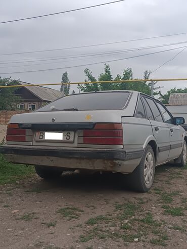 купить запчасти на опель вектра б: Mazda 626: 1986 г., 2 л, Механика, Бензин, Хетчбек