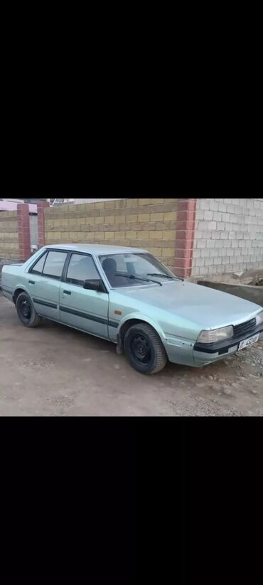 Mazda: Mazda 626: 1985 г., 1.6 л, Механика, Бензин, Седан