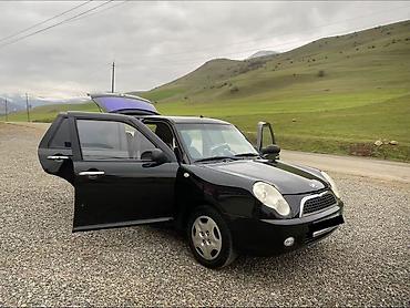 LIFAN: Lifan 320, 5 qapılı kompakt hetçbek. Xarici: - Qara rəng, xrom qapı — 5